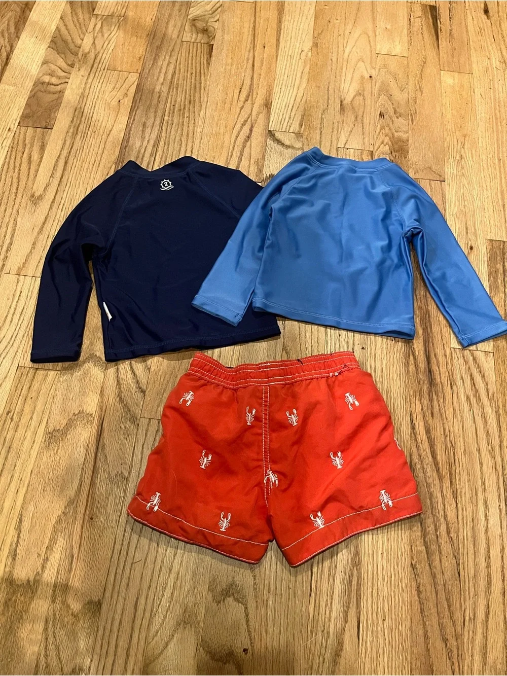 Bundle of 3 swim/sun 12 mos - swim trunk, zip up navy & light blue rash-guards
